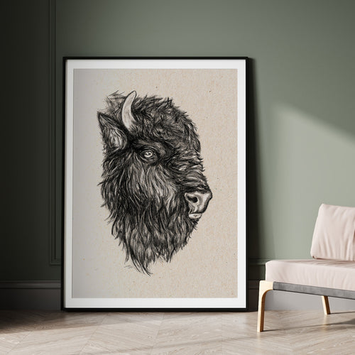 Hand-drawn bison in graphite. Realistic animal portrait on textured paper.