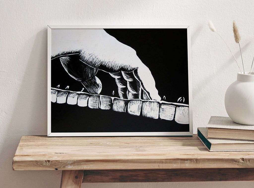 Black and white scratchboard-style artwork of a pianist’s hand pressing piano keys, with bold line texture on a black background.