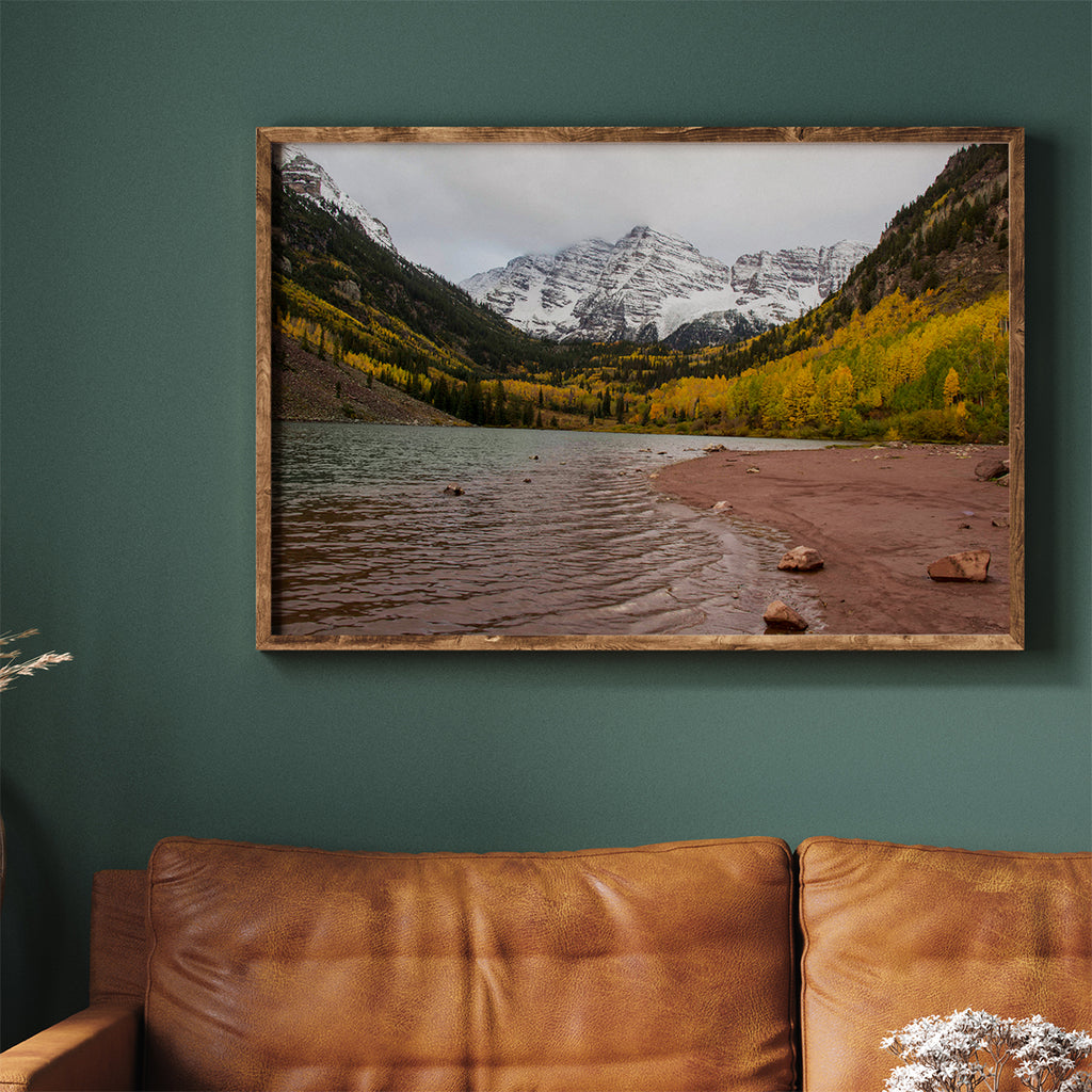 Stunning landscape artwork featuring a serene lake reflecting snow-capped mountains and vibrant golden aspen trees in autumn.
