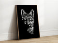 A black and white artistic portrait of a fox, presented as fine art print in a wooden frame.